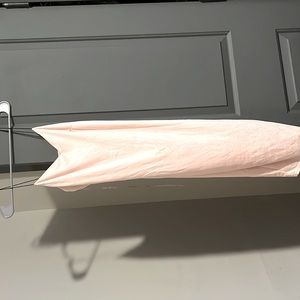 Blush pink Charlotte Russ dress with a side slit. Size is Small